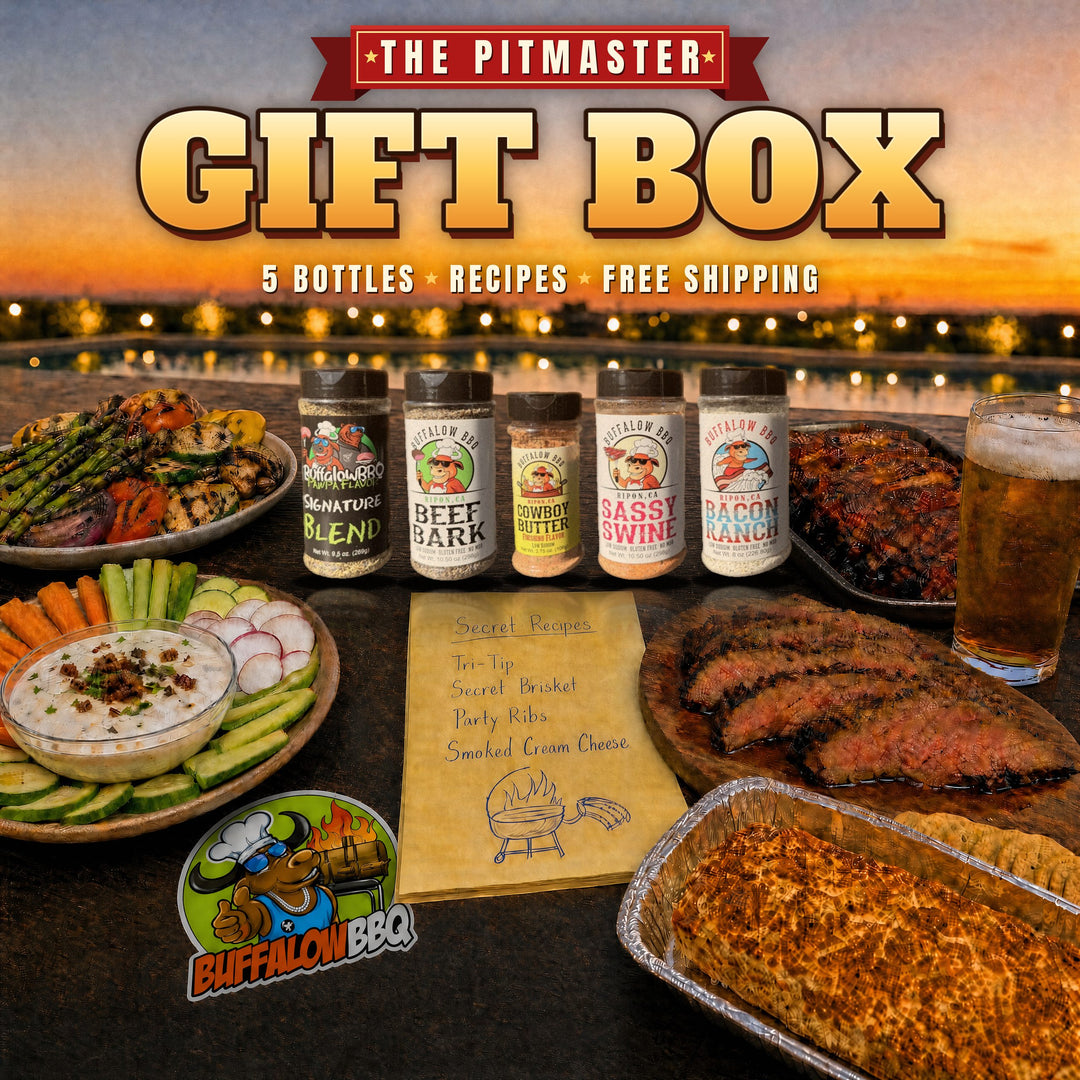 The Pitmaster Gift Box: five BuffalowBBQ seasonings on a backyard table at sunset with a printed recipe sheet and sticker.